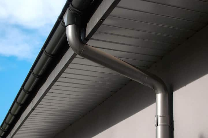 Corrosion-resistant galvanized gutters installed on a commercial building in Winston Salem